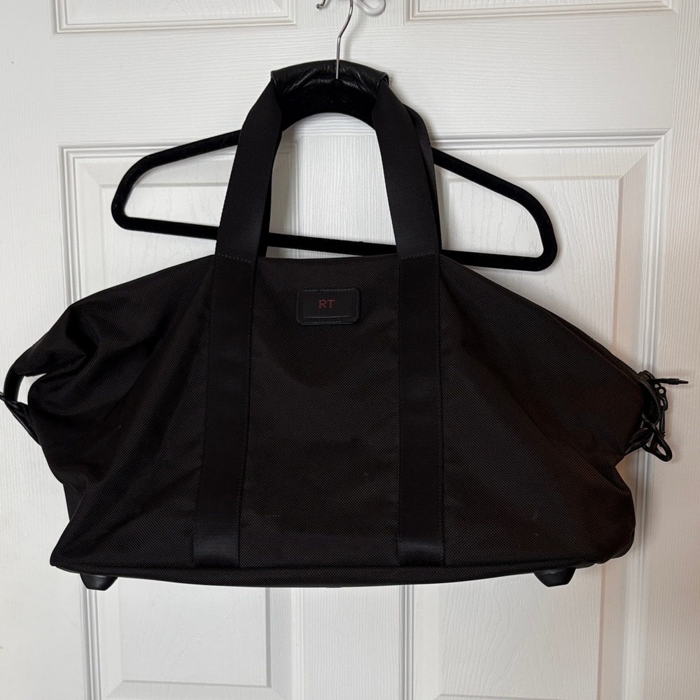 Sleek Black TUMI Duffel Bag